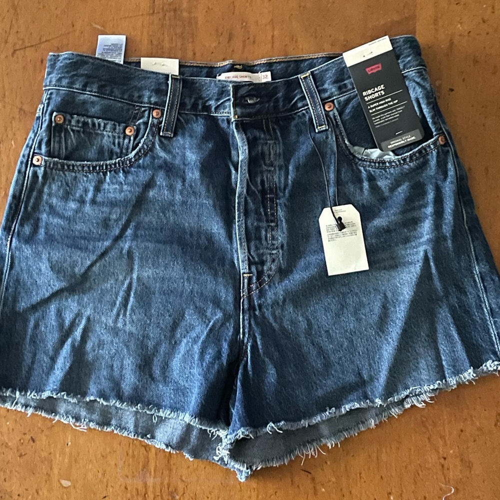 Levi's Blue Jean Shorts with Frayed Hem and Vintage Wash